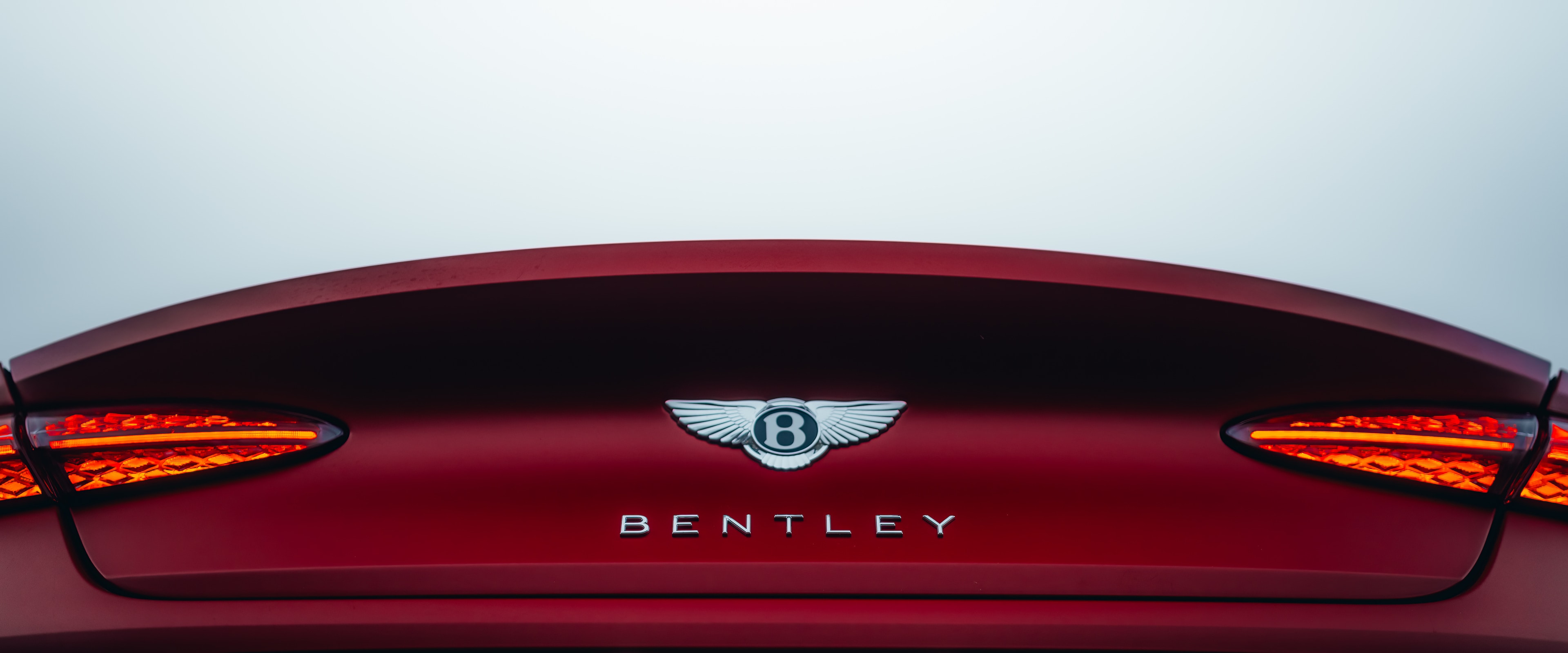 Continental GT rear — tail lights and BENTLEY badge in cinema crop