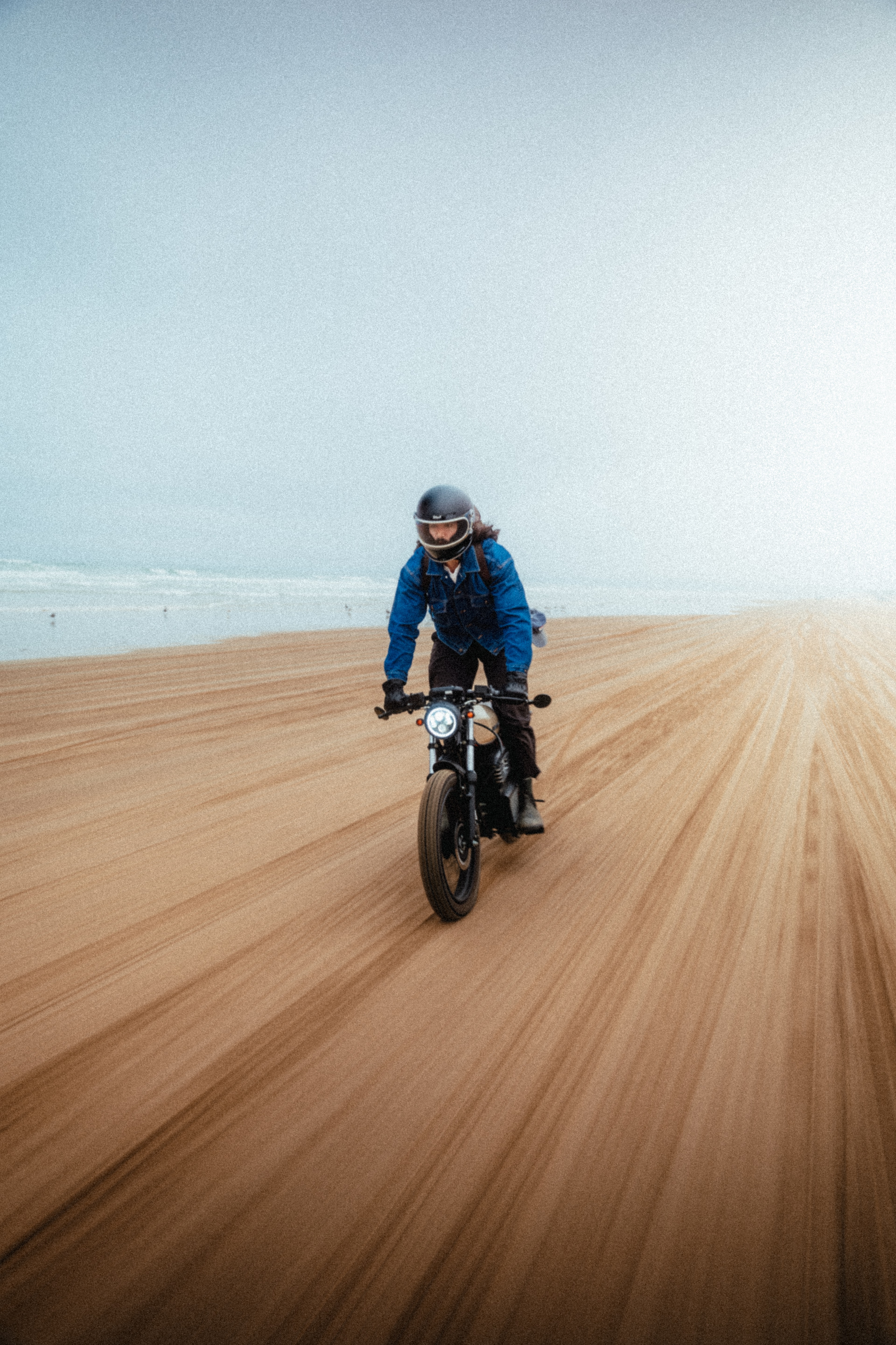 Rider on the Beachman in motion across the Pismo dunes