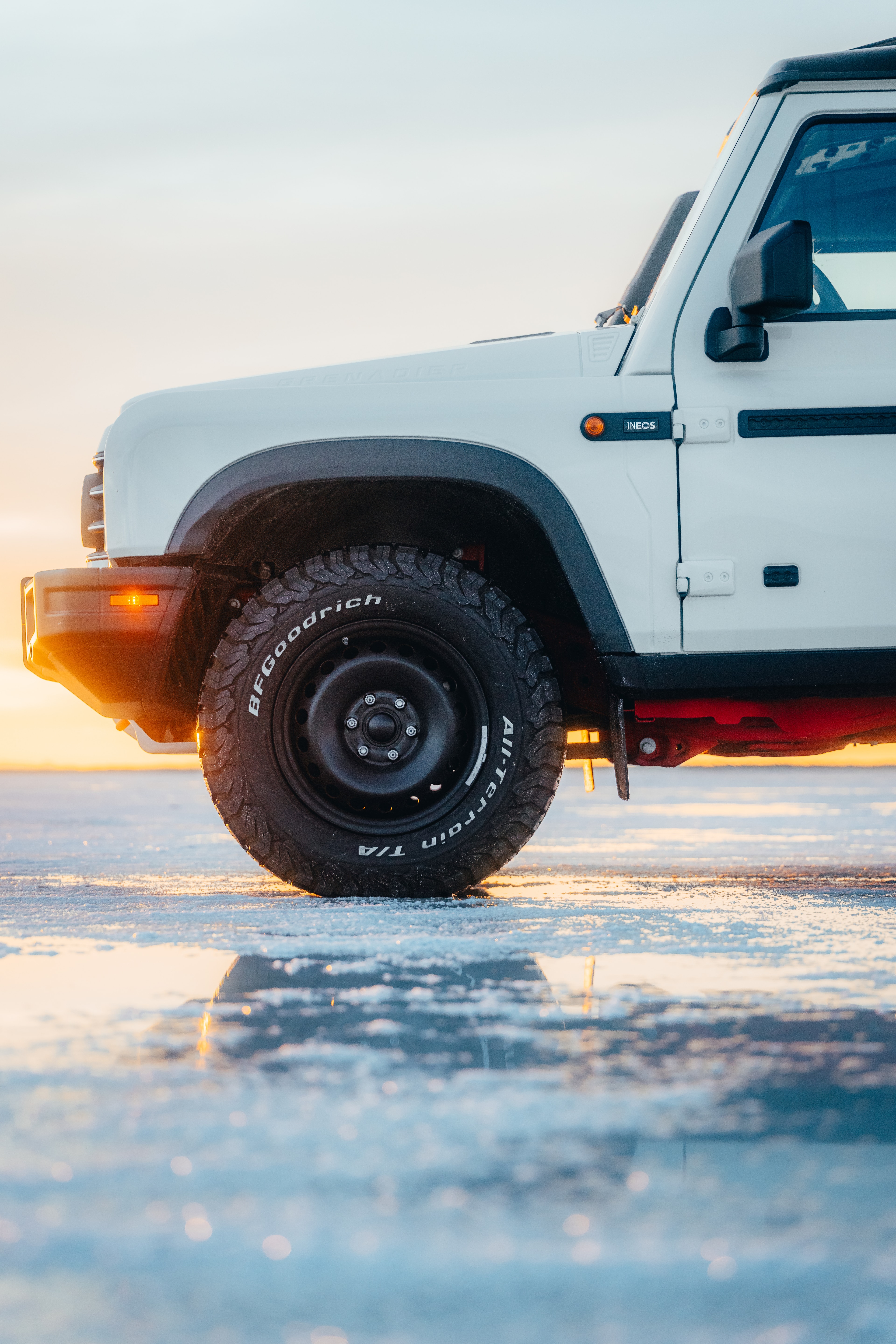 Wheel and fender detail of the Quartermaster on the wet salt flats